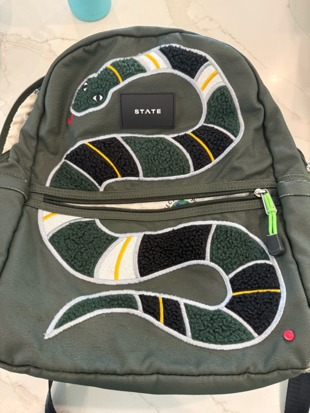 STATE Olive Green Backpack with Planet Liner Print